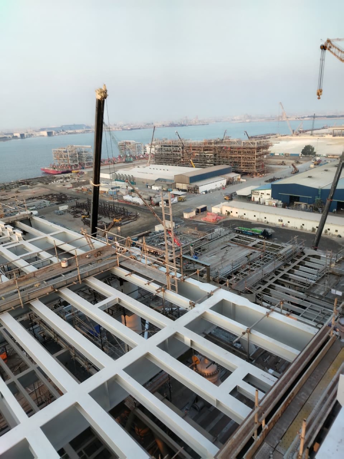 Aerial view of the construction yard and cranes
